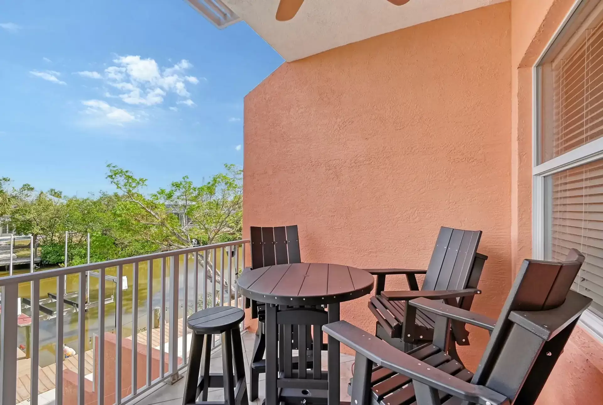 Coral House on Siesta private balcony overlooking the canal