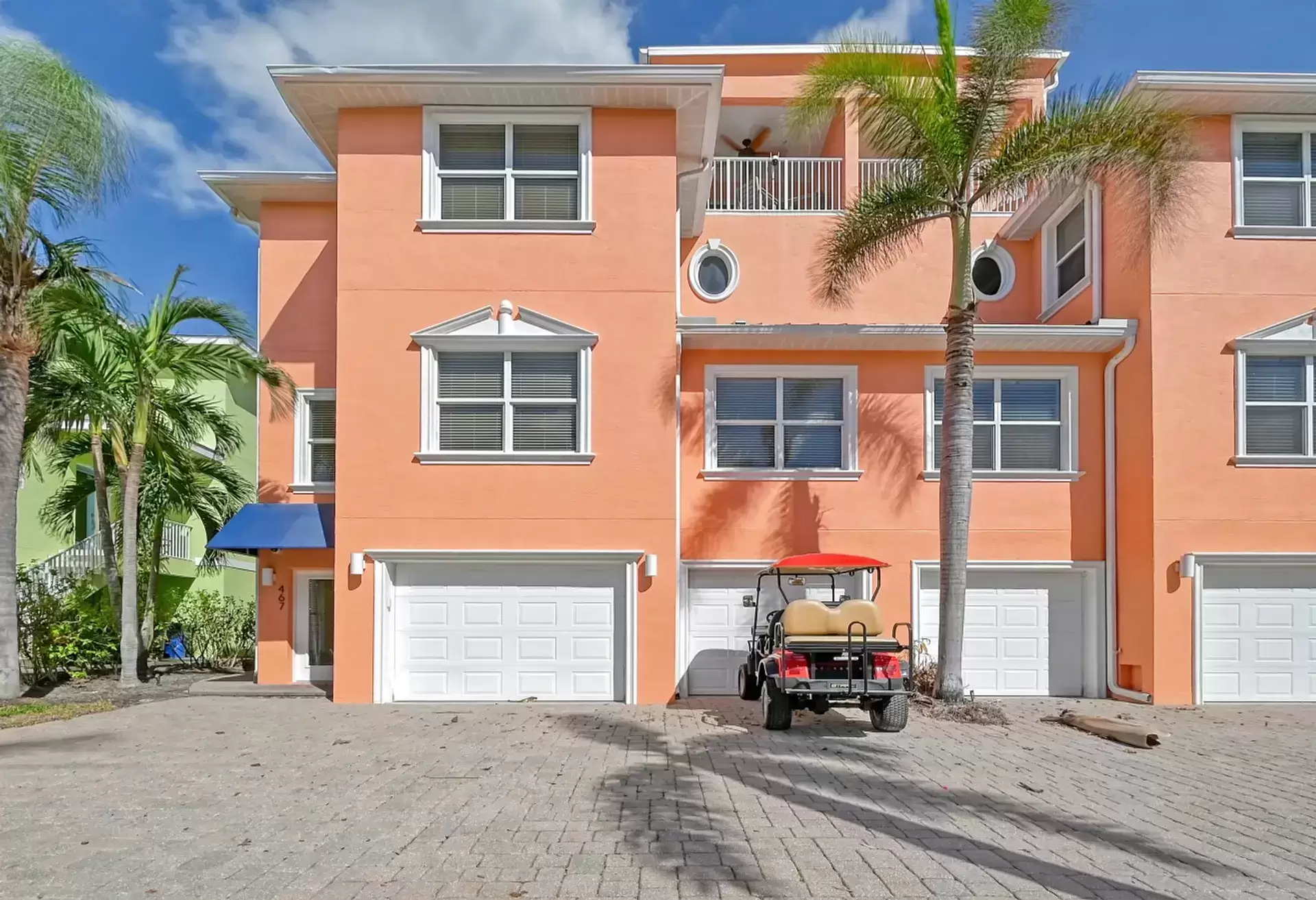 Coral House on Siesta exterior — canal-front luxury townhouse on Siesta Key Florida